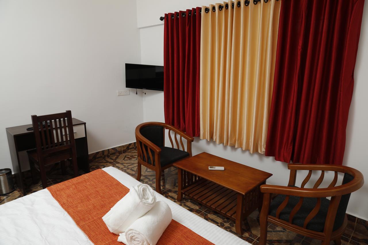 Puthens Clifton Inn Kottayam Εξωτερικό φωτογραφία
