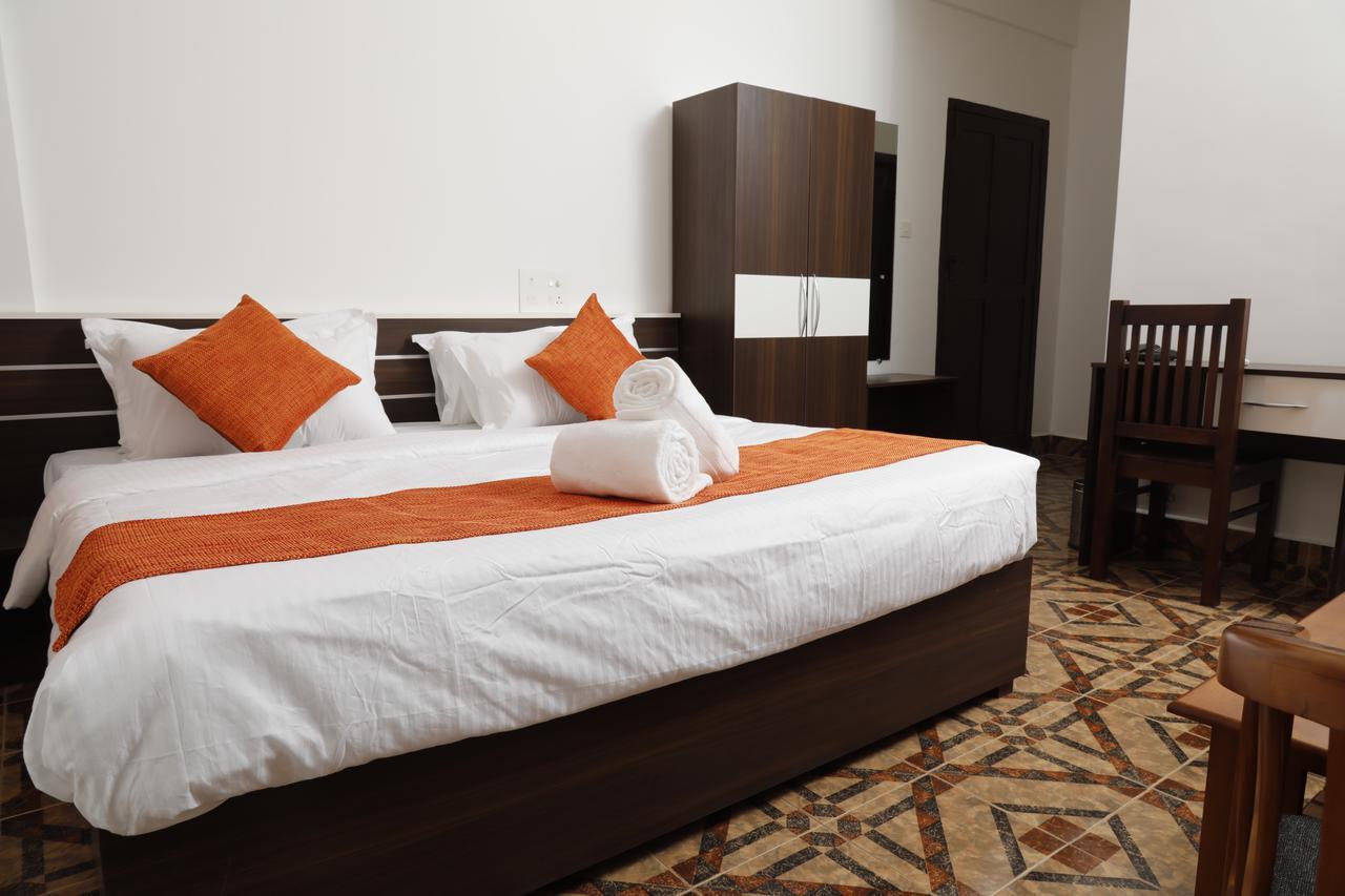 Puthens Clifton Inn Kottayam Εξωτερικό φωτογραφία