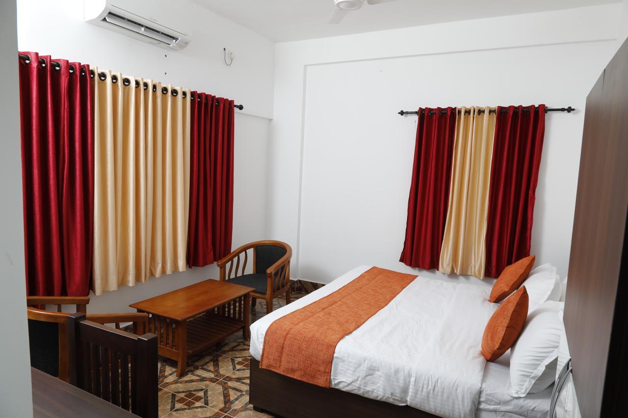 Puthens Clifton Inn Kottayam Εξωτερικό φωτογραφία